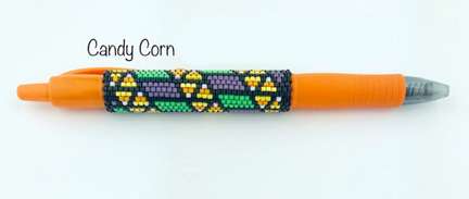 Candy Corn Ribbon Pen by Lori Ahlin©2021, Beaded Pen, Delica beads, Beads, Golden Knights, Vegas Golden Knights, Beaded Pen Class