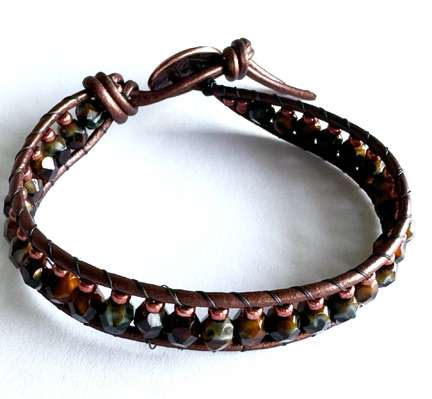 Fall Wrap by Lori Ahlin©2025, Bracelet, Leather Beaded bracelet, beaded Leather Wrap, Roman Wrap bracelet, Firepolish, Duracoat Seed beads		