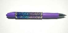 Celebrate the Year Pen by Lori Ahlin©2024, Beaded Pen, Delica beads, Beads, 2025 Pen, Beaded Pen Class, Miyuki Beads, Beading Classes, Bead Class in Henderson, Tubular Peyote	