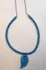 Aqua MOP Leaf Necklace by Rene' Despres©2024, Adding beads onto wire, Adding crimps and a Clasp & Open/Close Jump Rings