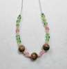 Gemstone Squared by Rene' Despres©2024, Adding beads onto soft flex wire, Adding a Clasp & Open/Close Jump Rings