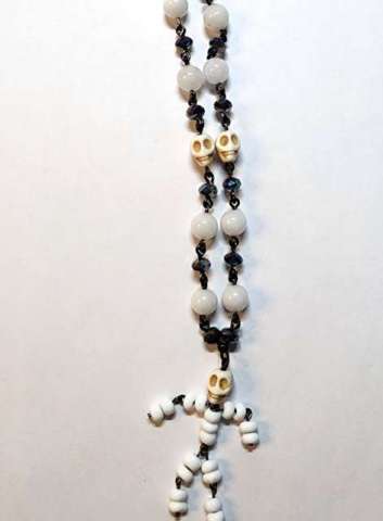 Skelly McBones, using chain, using jump rings, adding a clasp and making loops with pliers.