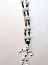 Skelly McBones, using chain, using jump rings, adding a clasp and making loops with pliers.