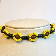 Sunflower Love by Rene' Despres©2026, an original design by Rene' Despres All Rights Reserved taught exclusively at Bead Jungle, Henderson, NV Sunflower Love, using chain, using jump rings, adding a clasp and making loops with pliers.