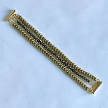 Triple Stack by Cindy Johnson ©2025, an original design by Cindy Johnson. All rights reserved Triple Stack by Cindy Johnson ©2025, Right angle weave bracelet, Two-hole beaded bracelet