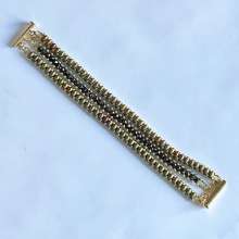Triple Stack by Cindy Johnson ©2025, an original design by Cindy Johnson. All rights reserved Triple Stack by Cindy Johnson ©2025, Right angle weave bracelet, Two-hole beaded bracelet
